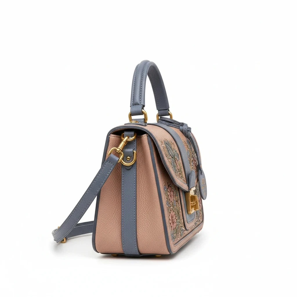 Amelia Rose Designs Roselier Valen satchel in slate-blue and beige leather with intricate floral tooling and gold hardware